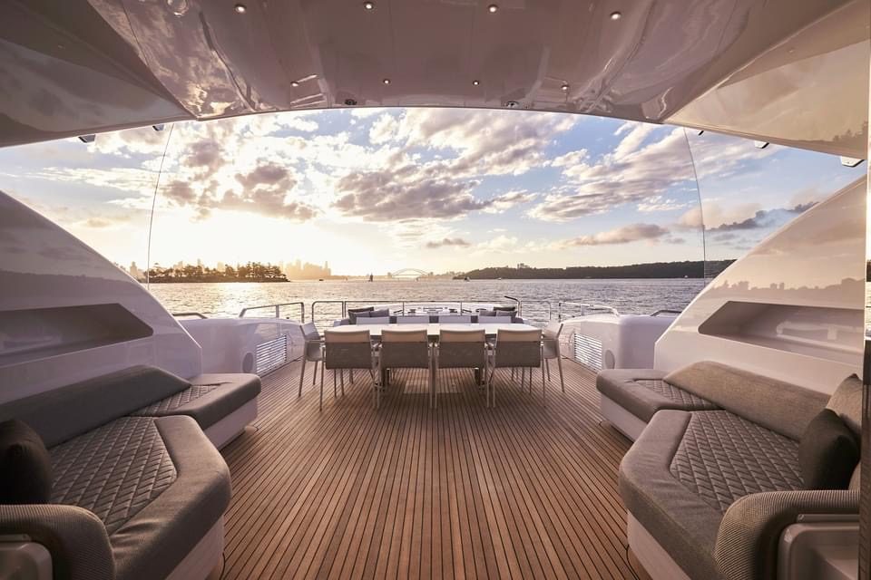 Laid teak cockpit deck on a superyacht at sunset