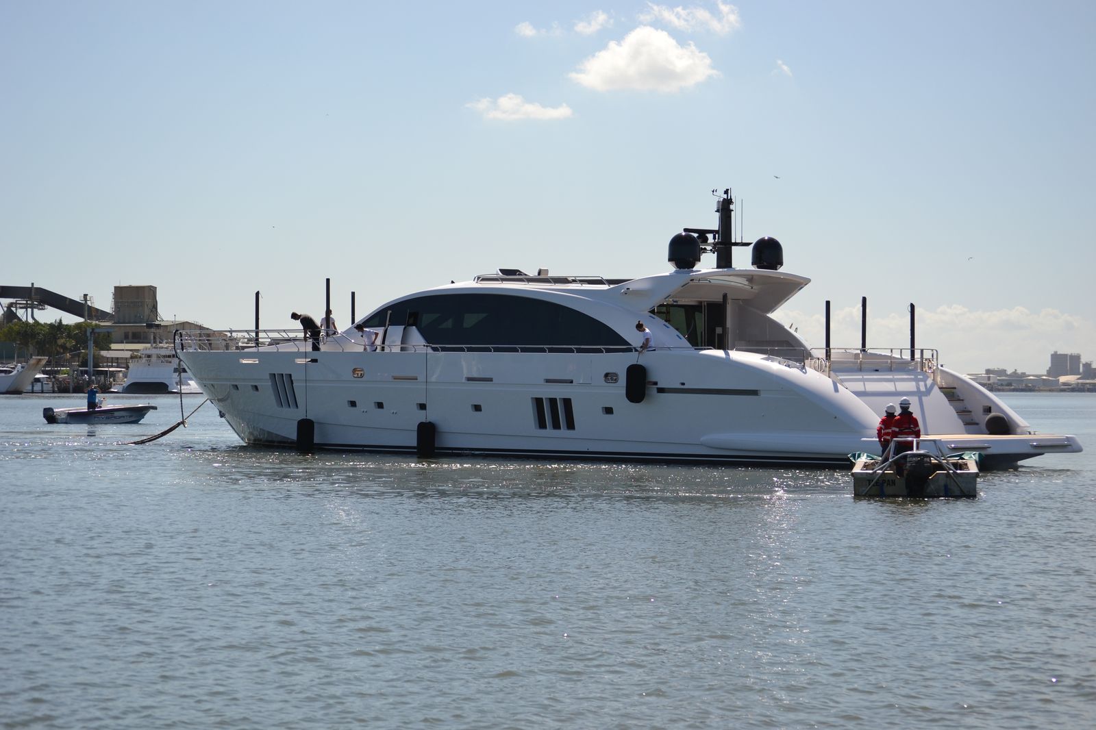 Superyacht on the water with crew aboard after launch